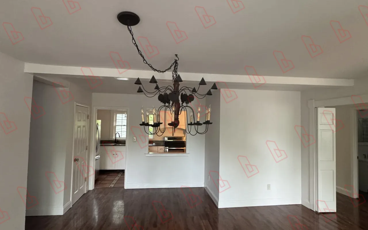 Ann Arbor home before the remodel with dark floors and dated finishes